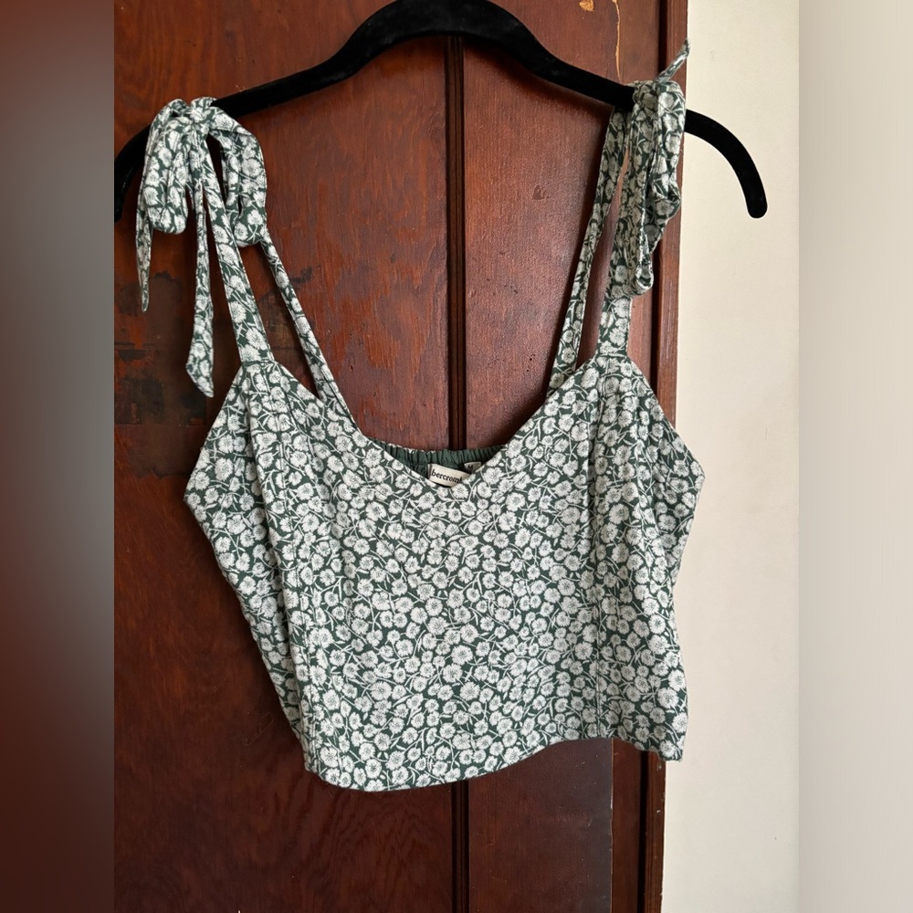 Tank top and skirt set. Tie details on the tank top. Flowy skirt.